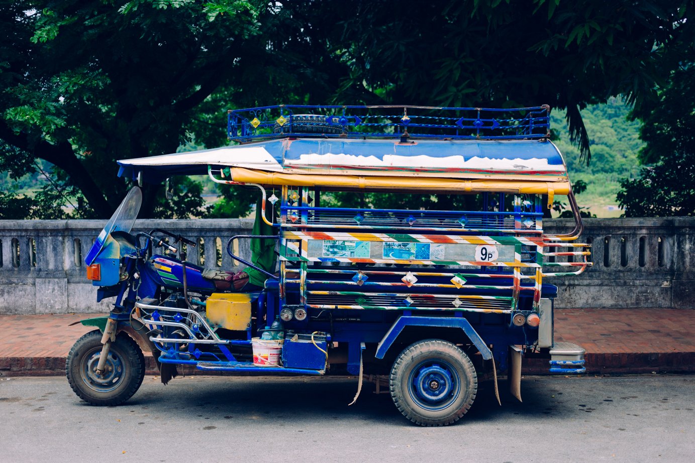 Tuk tuk, sir? Good price, very cheap!